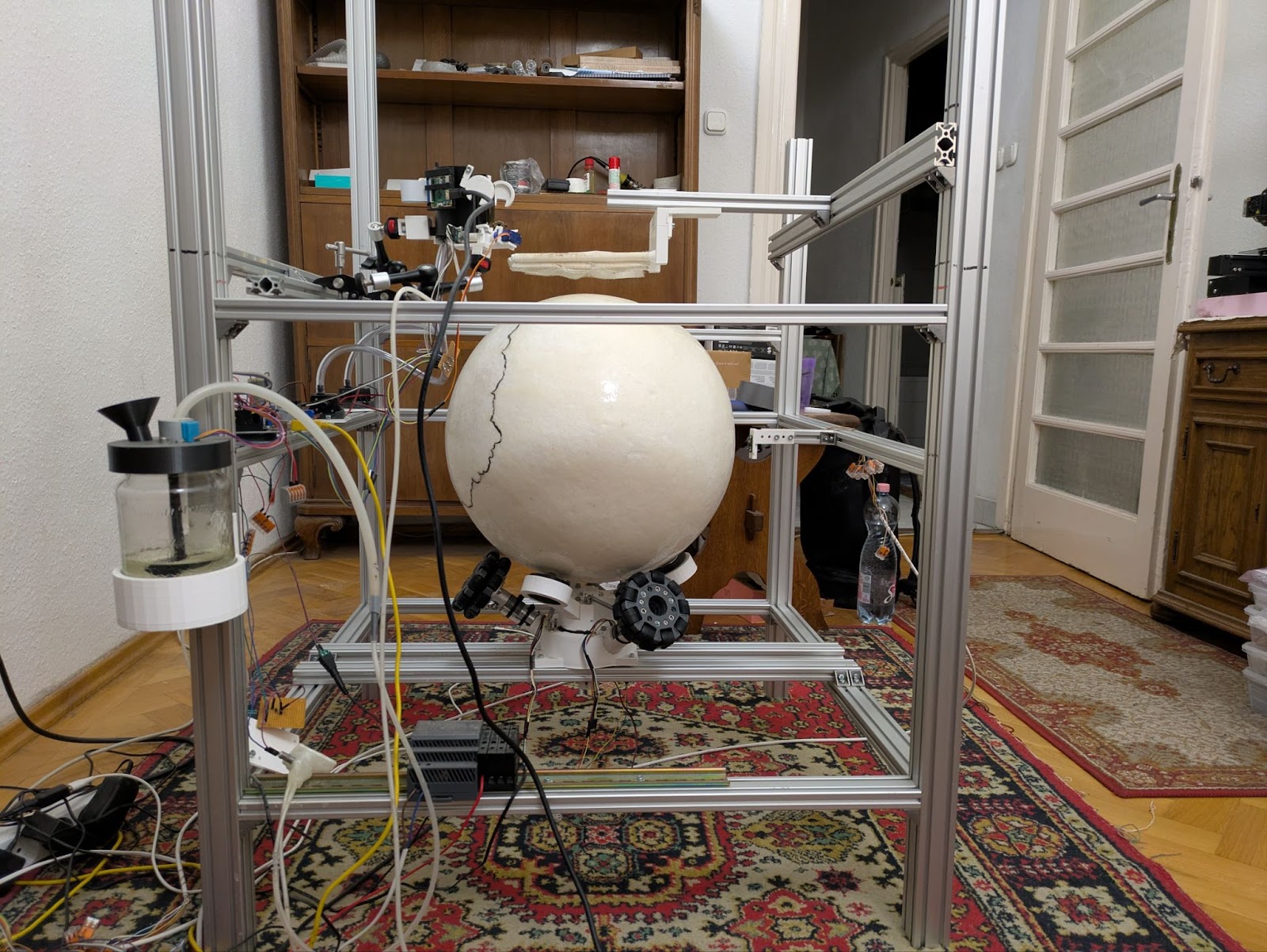 The complete Rat VR System, showing the frame, locomotion ball, harness, and display.