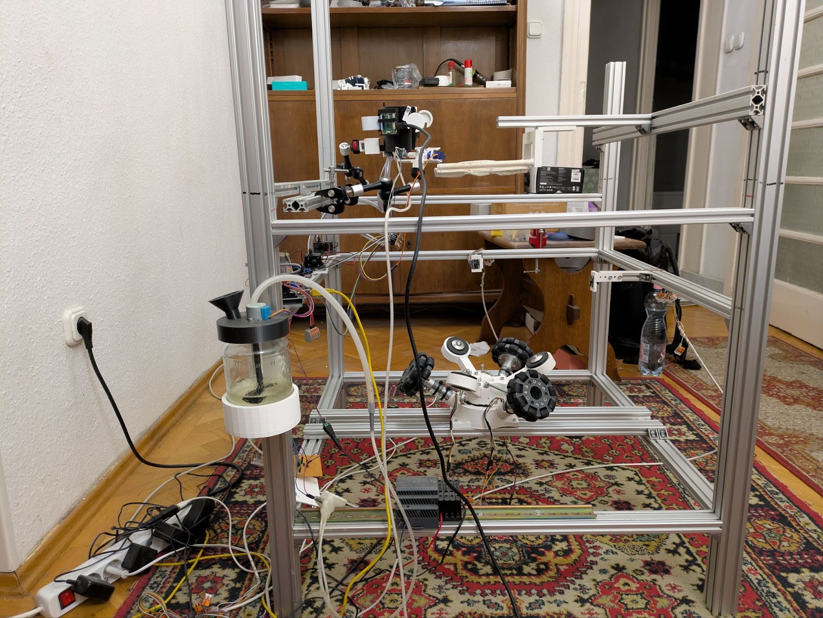 The assembled aluminum frame with the locomotion system mounted.