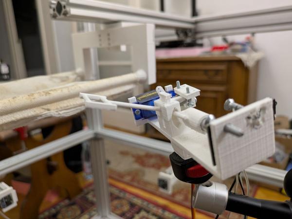 The assembled trigger mechanism, showing the lever and servo.